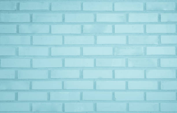 détail de la photo de fond moderne du mur de briques bleues. fond de texture de mur en brique claire bleue pour bloc de carreaux de pierre peint en papier peint blanc de couleur claire design intérieur et extérieur moderne. - block blue brick building activity photos et images de collection