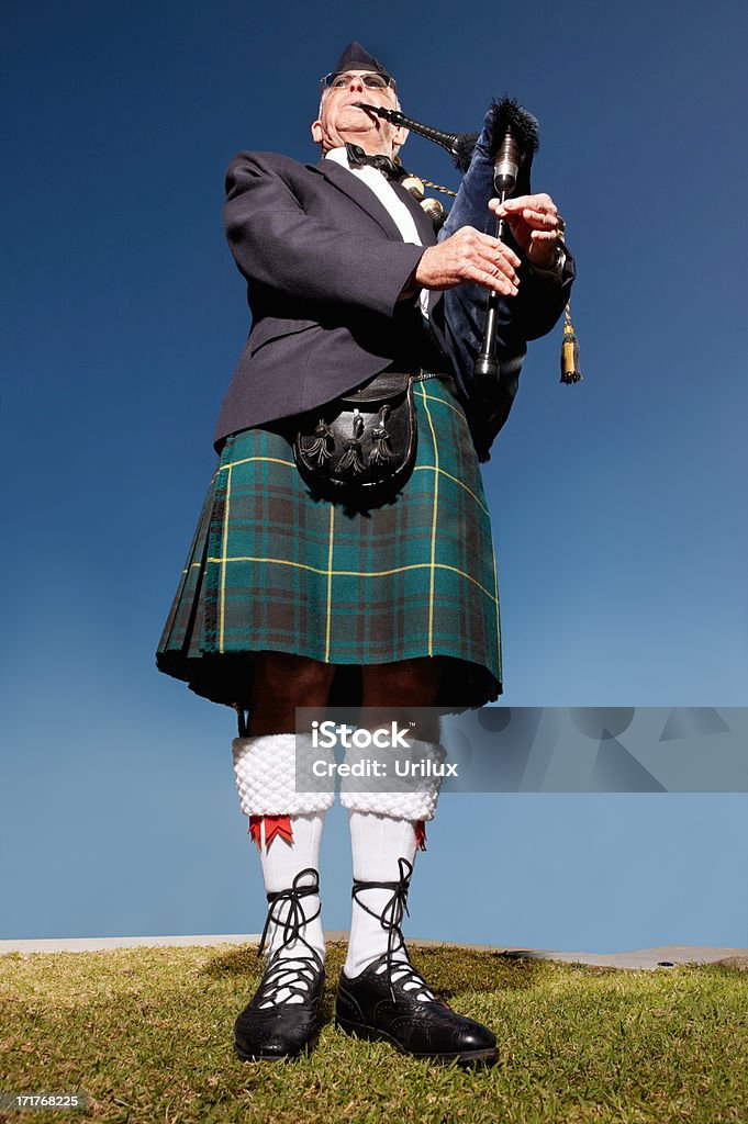 Senior MacLeod usando kilt e jogar gaitas de foles - Royalty-free Arte, Cultura e Espetáculo Foto de stock