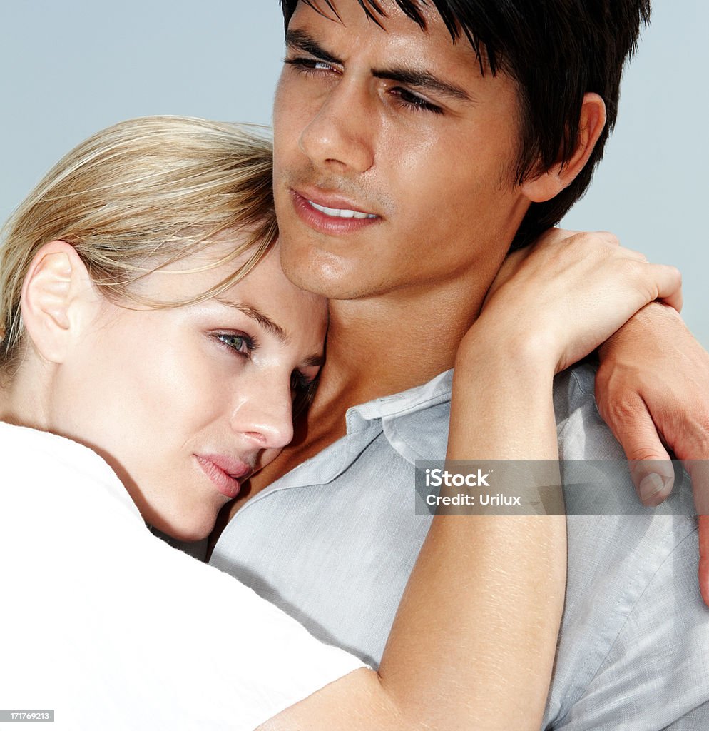 Closeup of a cute young hugging eachother  Adult Stock Photo