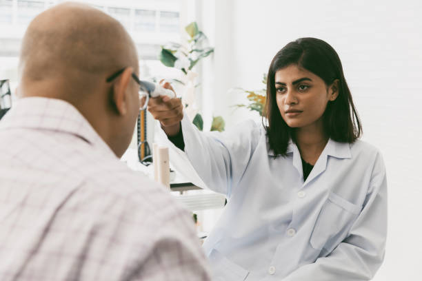 istock Patient talking to doctor in office on joint bone problem. 1717696207