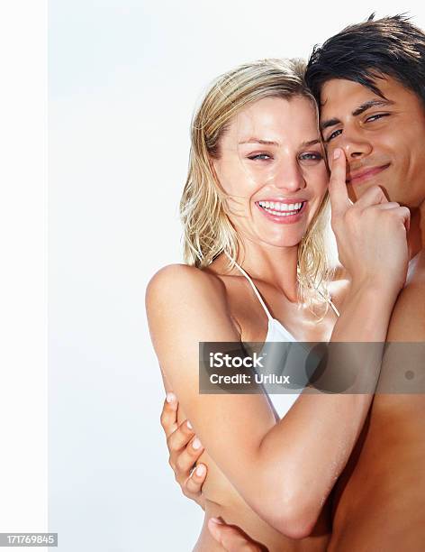 Cheerful Young Woman With Boyfreind In A Playful Mood Stock Photo - Download Image Now