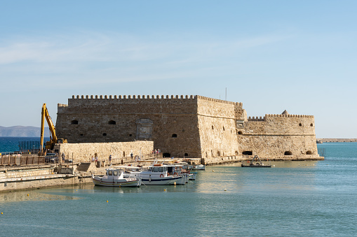Looking out to sea and the Rocca a Mare Fortress  from the Port of Heraklion.  Heraklion, Crete, Greece.