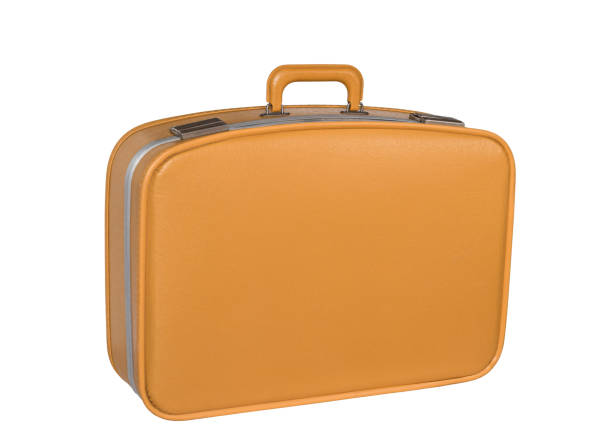 Old vintage yellow suitcase isolated cutout