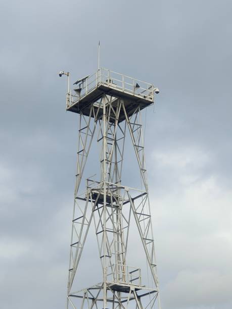 Tower at a ferry port Tower for broadcasting announcements at the ferry terminal with loudspeakers so that the sound can be heard far away. Equipped with CCTV to monitor the surroundings of the harbor. ferry terminal audio stock pictures, royalty-free photos & images