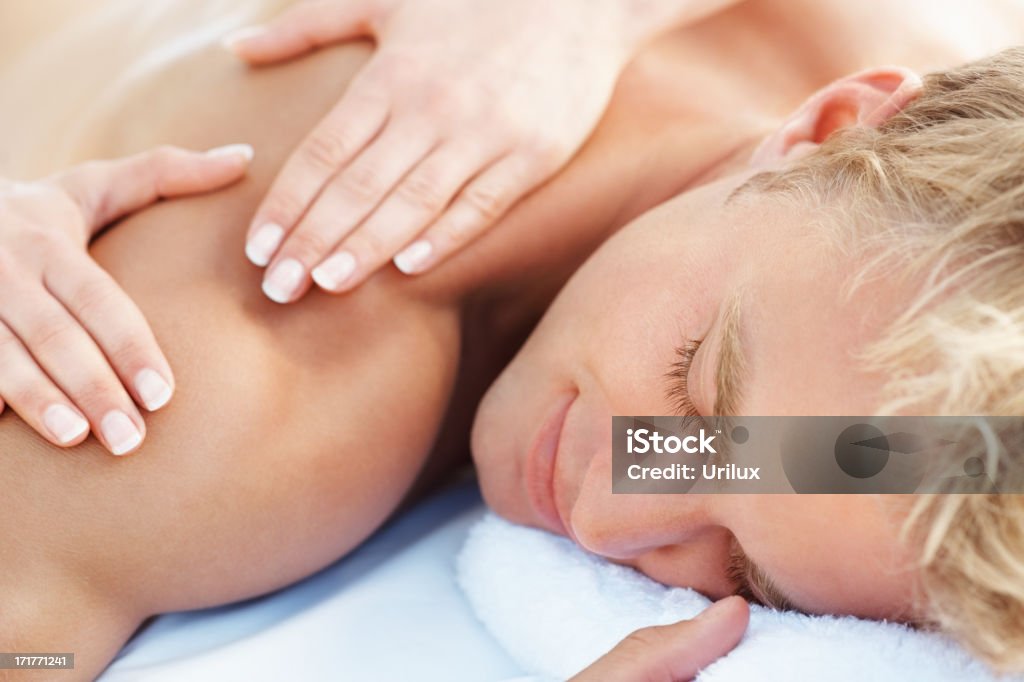 A Boy Using Body Message Happy Man Getting A Body Massage Stock Photo - Download Image Now ...