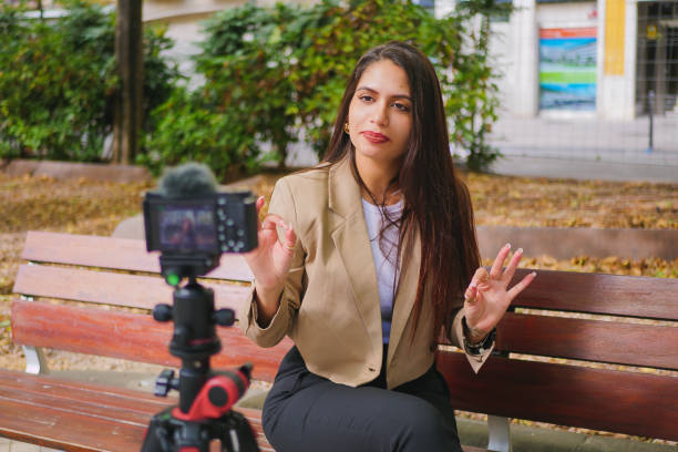 istock Content creator woman vlogging for social making speech to camera 1717714037