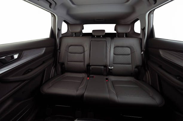 Wide leather back rear car seat Wide leather back rear car seat with isolated windows car door panels stock pictures, royalty-free photos & images