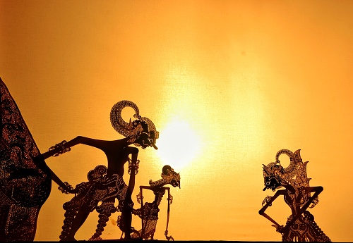 a beautiful silhouette of wayang, these are few of lots of puppets used for the Indonesian traditional puppet show especially in Java region which are made from goat's skin