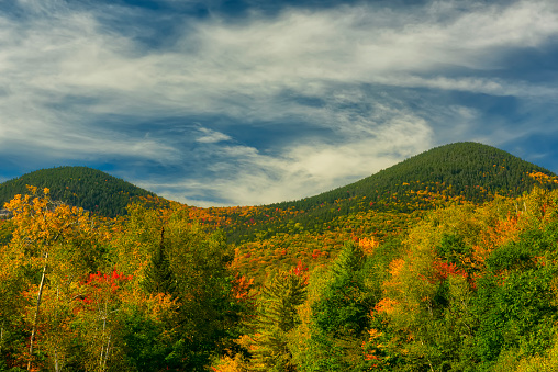 beautiful autumn landscape. View of the colorful mountains and bright colorful trees on a sunny autumn day. White Mountain National Park.New Hampshire. USA.