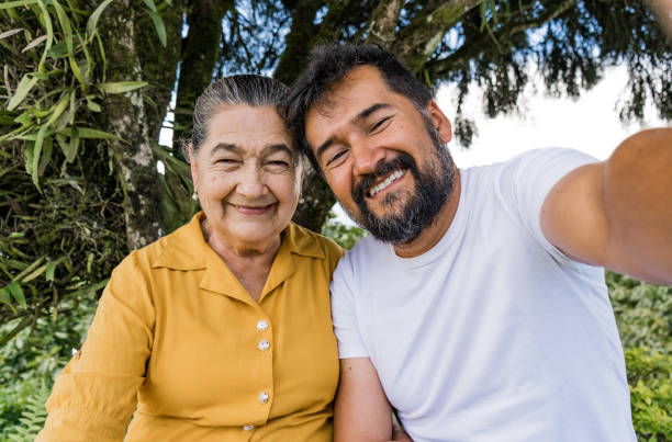 istock mother and son enjoying the outdoors while taking a selfie with a happy smile on their faces 1717824743
