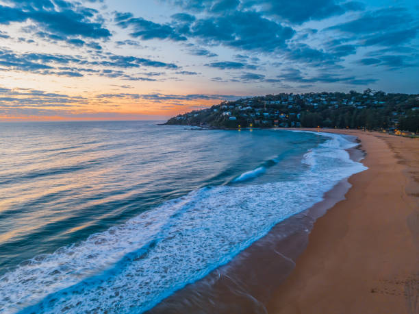 istock Sunrise at the seaside with clouds 1717828488