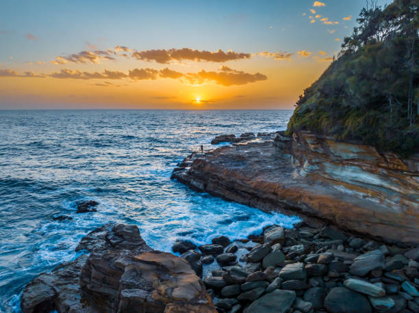 istock Sunrise Rocks at the Seaside 1717829551