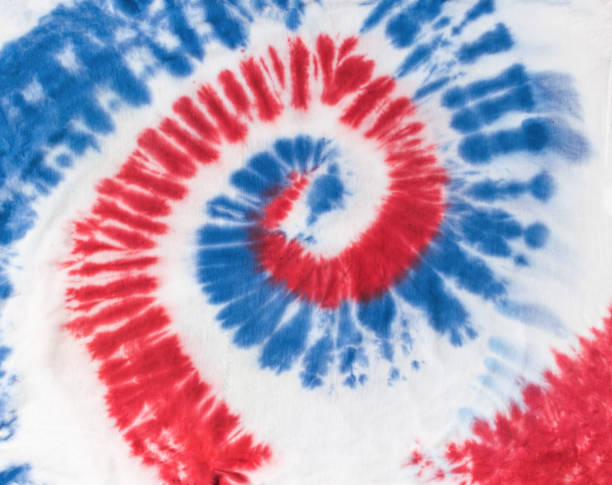 istock White hand-dyed fabric in tie dye style. 1717842760