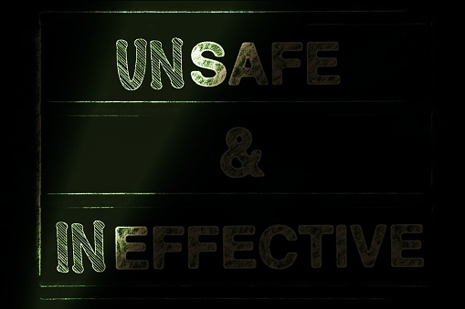 A light shines on the prefix 'un' in front of the word 'safe'and the prefix 'in' in front of the word 'effective' for a shining a light on a new narrative concept. Please note the following. The library definition of the word safe is free from harm or risk. The library definition of the word unsafe is not free from harm or risk. The library definition of the word effective is producing the effect it said it would do. The library definition of the word ineffective is not producing the effect it said it would do. This is part of my Signs of the Times collection for social history.