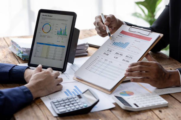 istock Business Documents, Auditor business Team checking searching document legal prepare paperwork or report for analysis TAX time,accountant Documents data contract partner deal in workplace office 1717953755