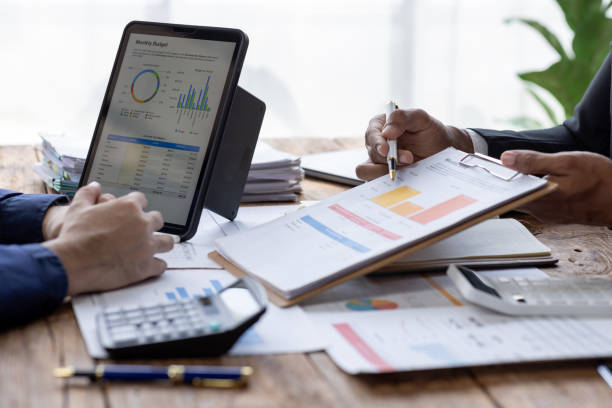 istock Business Documents, Auditor business Team checking searching document legal prepare paperwork or report for analysis TAX time,accountant Documents data contract partner deal in workplace office 1717953771