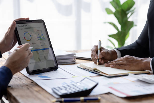 istock Business Documents, Auditor business Team checking searching document legal prepare paperwork or report for analysis TAX time,accountant Documents data contract partner deal in workplace office 1717953773
