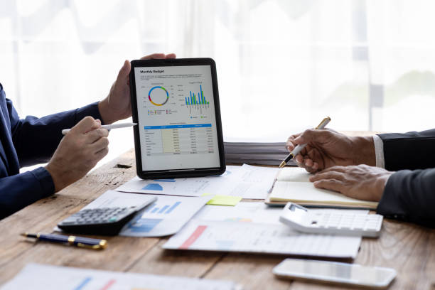 istock Business Documents, Auditor business Team checking searching document legal prepare paperwork or report for analysis TAX time,accountant Documents data contract partner deal in workplace office 1717953791