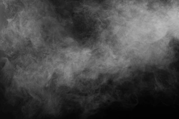 White and gray smoke or fog against black background - fotografia de stock