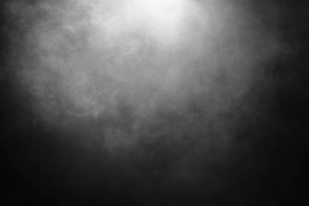 istock White and gray smoke or fog against black background 1717993376