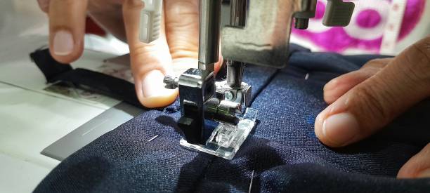 istock A woman is sewing. 1718011297