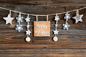 Wooden Decorated Christmas Label With Text Happy Holidays