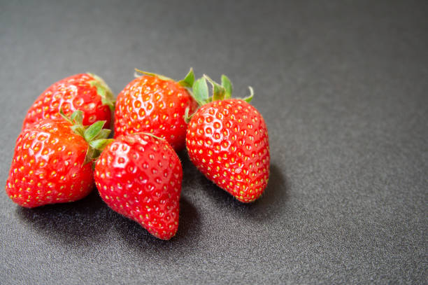 istock closeup of fresh strawberries 1718025565