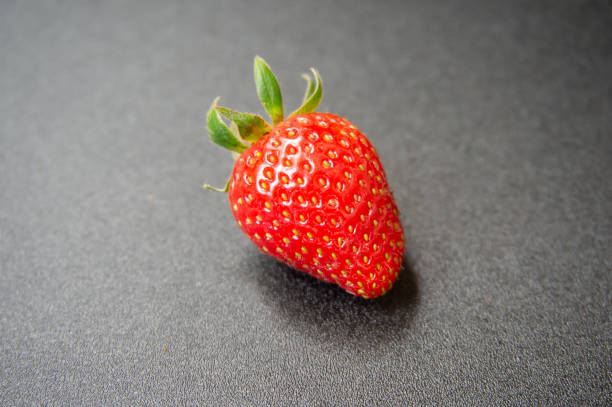istock closeup of fresh strawberries 1718025579