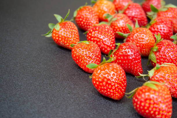 istock closeup of fresh strawberries 1718025594