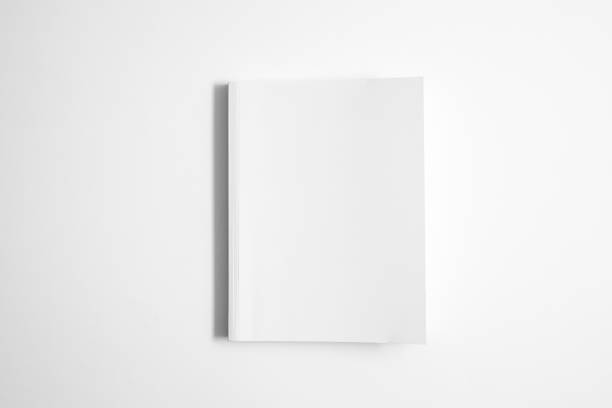 istock Mockup of white book, notebook, copybook, blank notepad cover on white background. Layout mock up ready for your design preview. 1718094604