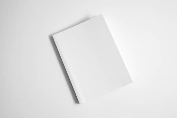 istock Mockup of white book, notebook, copybook, blank notepad cover on white background. Layout mock up ready for your design preview. 1718094609