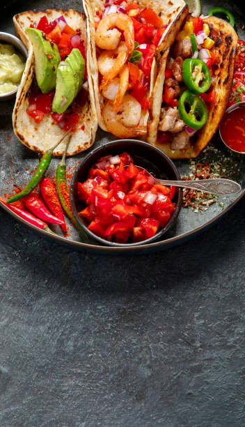 istock Mexican street tacos flat lay composition with lime, pepper and sauce 1718096685