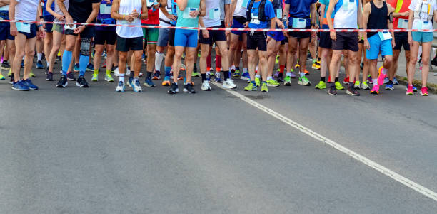 istock Just Prior to Start of a Marathon Running Race 1718100547