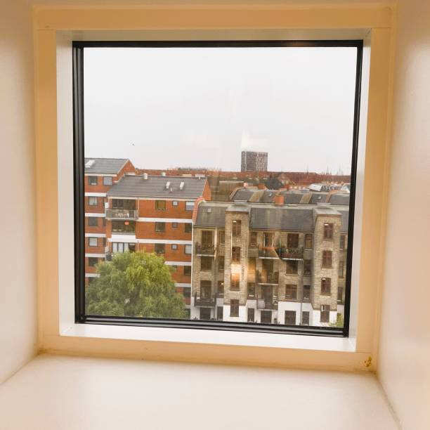 istock View of Copenhagen seen through  window 1718104752