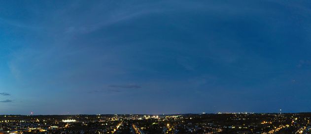 Ultra wide High resolution and High Angle Panoramic View of Illuminated Luton City of England Great Britain, UK. Drone's Camera Footage of British Town Captured Just After Sunset
