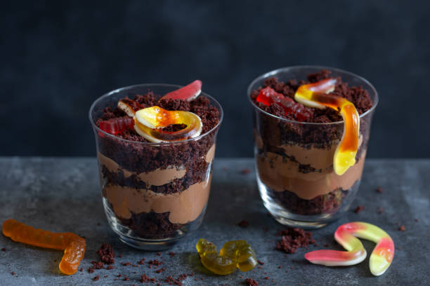 Graveyard dirt chocolate cups with  gummy worms
