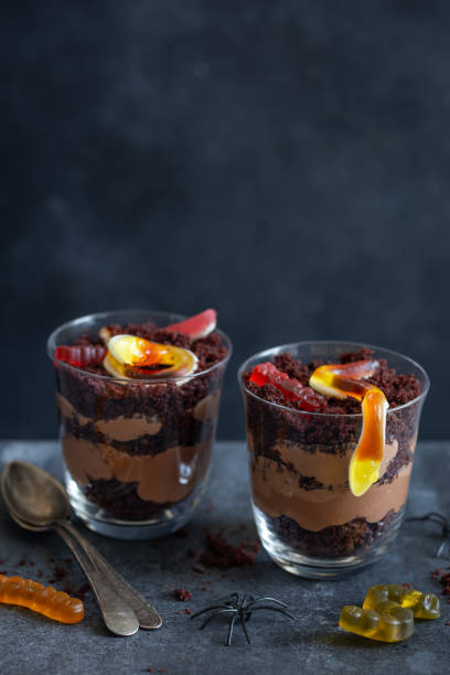 istock Graveyard dirt chocolate cups with  gummy worms 1718149335