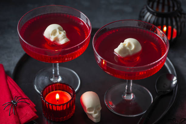 istock Red bloody berry jelly with white chocolate sculls 1718149362