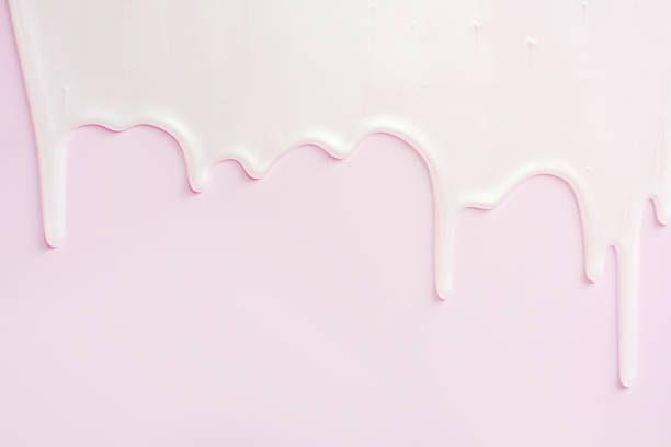 istock liquid shampoo or shower gel dripping down on light pink background close-up. 1718243695