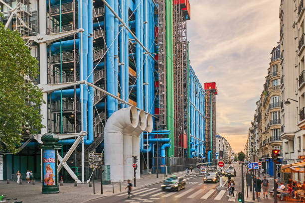 Paris Paris, France - July 11, 2023: Pedestrians and traffic on Rue Beaubourg at the Center Pompidou in the evening. pompidou center stock pictures, royalty-free photos & images