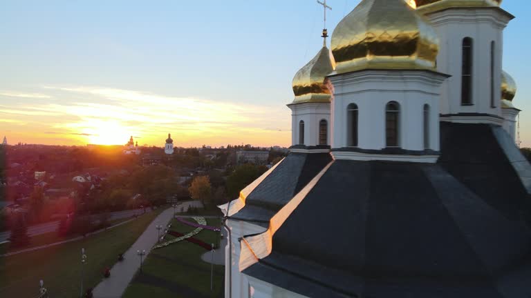 Catherine's Orthodox Church in Chernihiv revealing sun during sunset golden hour