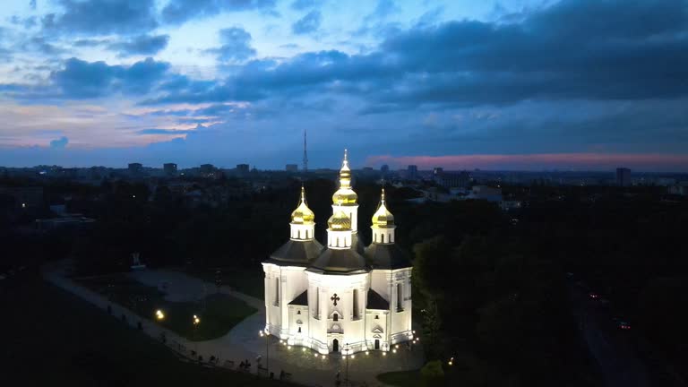 Illuminated Catherine's Orthodox Church during twilight in Chernihiv