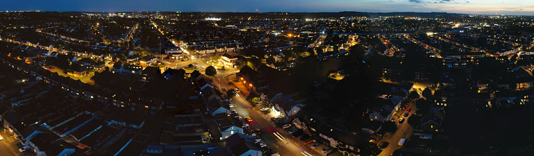 Ultra wide High resolution and High Angle Panoramic View of Illuminated Luton City of England Great Britain, UK. Drone's Camera Footage of British Town Captured Just After Sunset