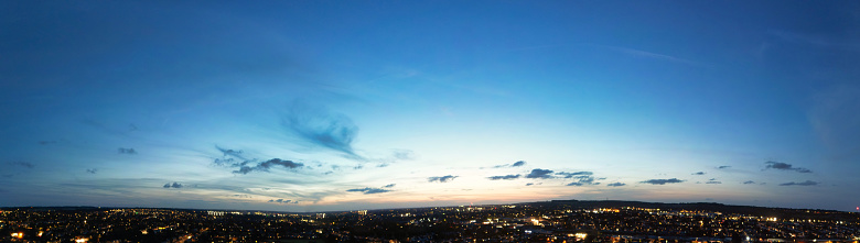 Ultra wide High resolution and High Angle Panoramic View of Illuminated Luton City of England Great Britain, UK. Drone's Camera Footage of British Town Captured Just After Sunset