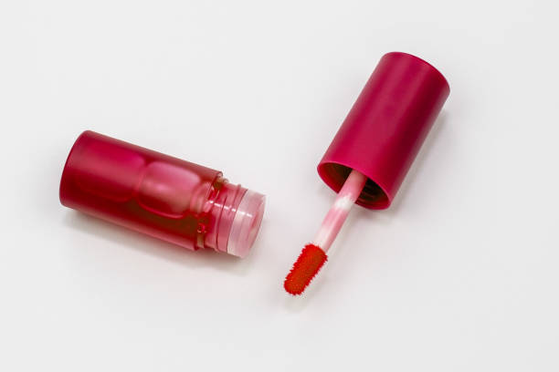istock Pink lip gloss on white background, liquid lipstick 1718421851