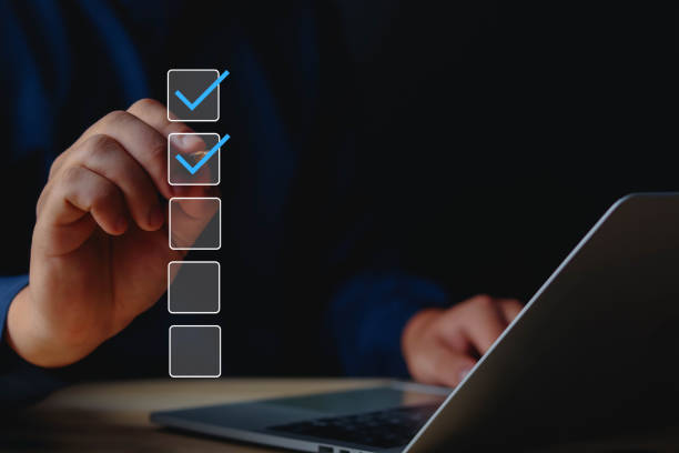 istock Businessman showing check mark summarizing work details, checklist, documents and online quality assessment standards. 1718431213