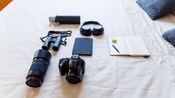istock Electronic objects, lenses and camera prepared and organized for travel 1718432920