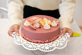 cake in woman's hands