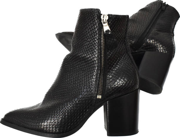 istock Black chunky heels boots isolated on white, reptile leather ankle boots for women, basic snake skin fall boots 1718471215