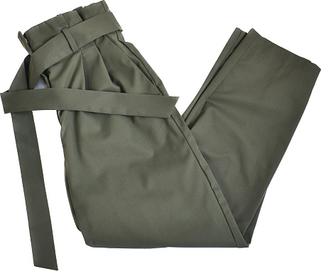 A flat lay image of folded khaki green pants with a belt on a white background.